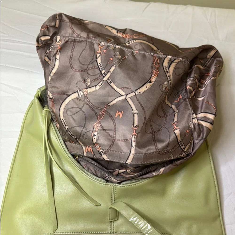 Green‎ Hobo Bag with Minimalist Design and Relaxed Silhouette